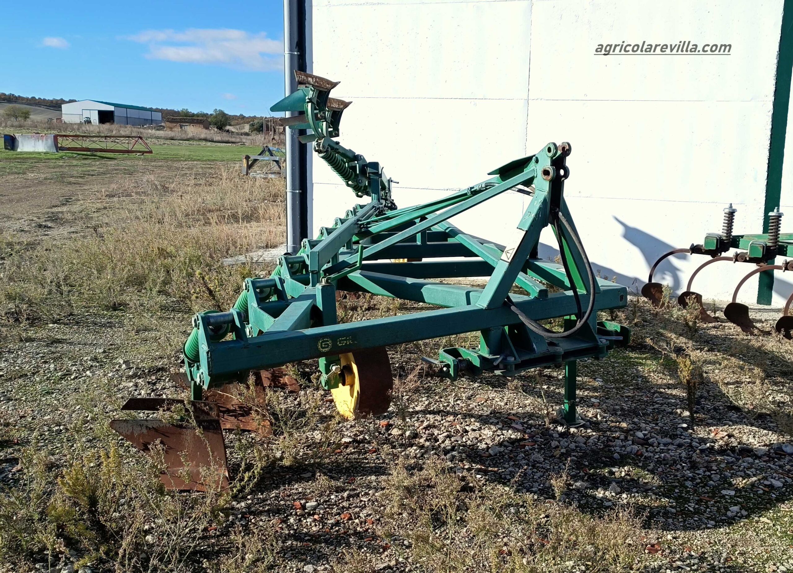 Arado de cohecho usado de 10 brazos marca Gil, modelo ACH-10B